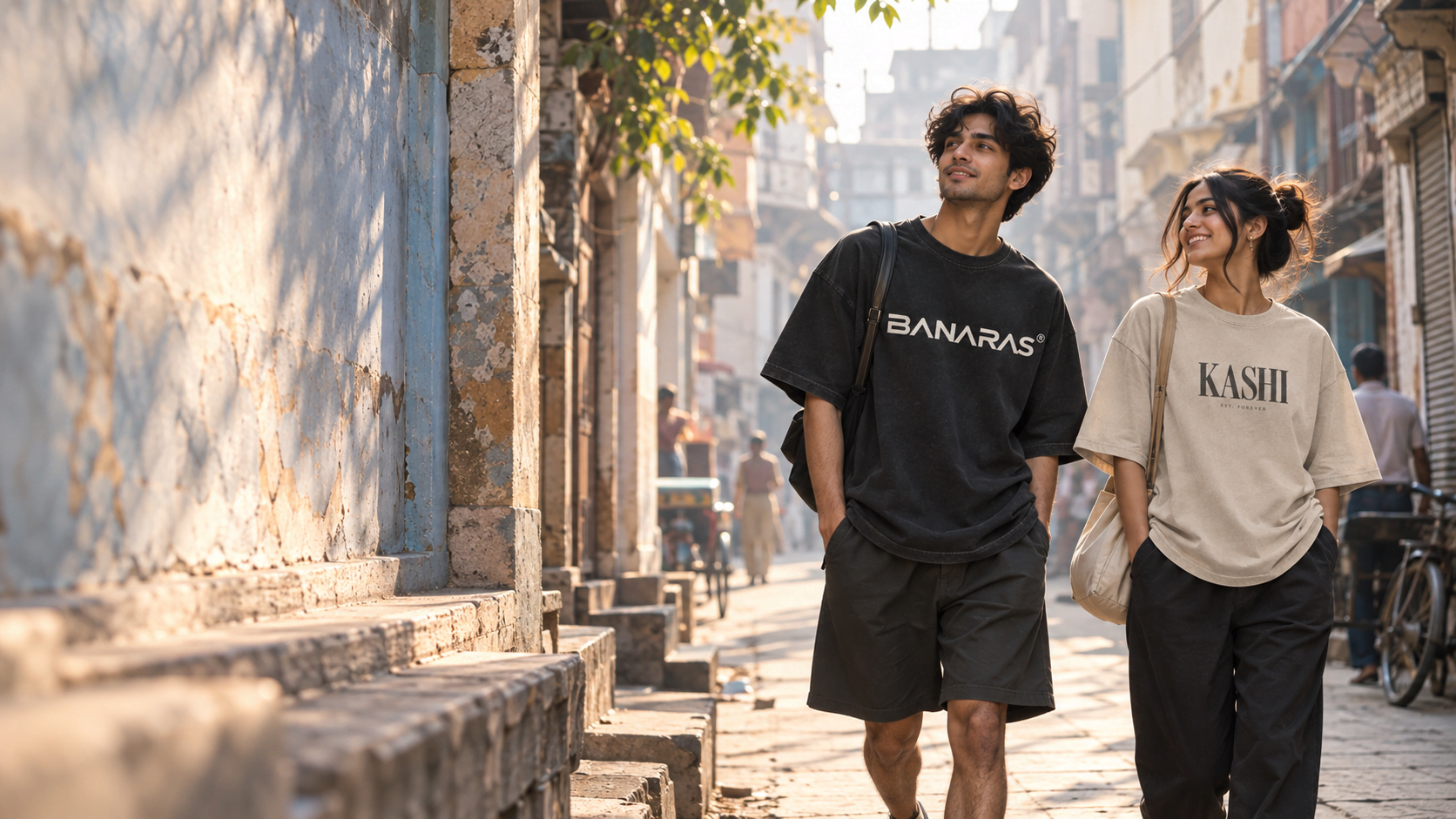 Banarasian heavyweight tees and French terry hoodie in a sunlit stone colonnade